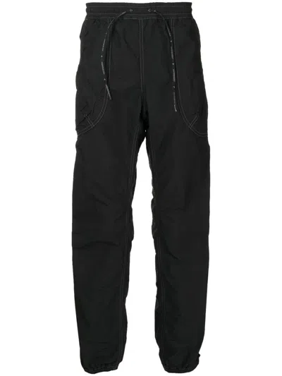 And Wander Contrast-stitch Track Pants In Black