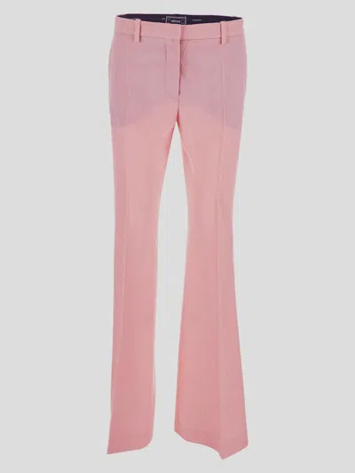 Versace All-over Logo Flared Trousers In Pastel Pink
