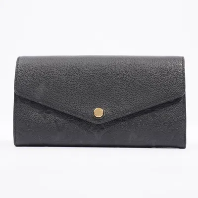 Pre-owned Louis Vuitton Sarah Wallet Empreinte Leather In Black