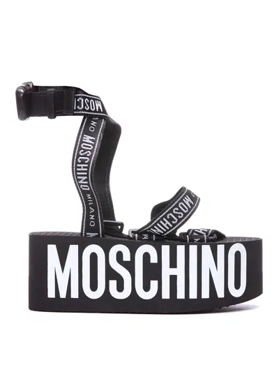 Moschino Wedge Leather Blend Sandals In Black