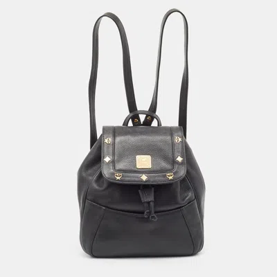 Mcm Leather Studded Flap Backpack In Black