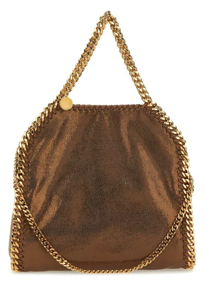 Stella Mccartney Handbags. In Gold
