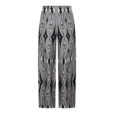 Amiri Trousers In Black