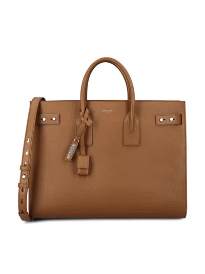 Saint Laurent Handbags In Brown
