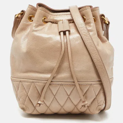 Miu Miu Vitello Shine Leather Drawstring Bucket Bag In Neutral