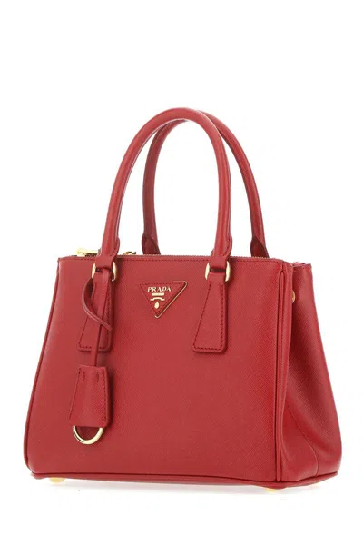 Prada Handbags. In Red