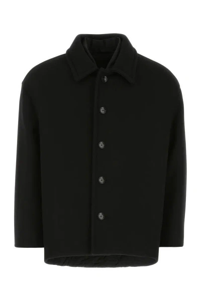 Valentino Garavani Coats In Black