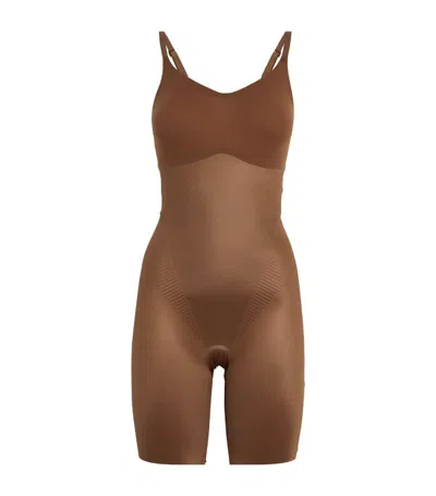 Spanx Invisible Shaping Mid-thigh Bodysuit In Brown