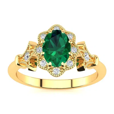 Sselects 1 Carat Oval Shape Emerald And Halo Diamond Vintage Ring In 14 Karat Yellow Gold In Green