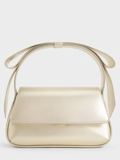 Charles & Keith Leather Metallic Bow Top-handle Bag In Champagne