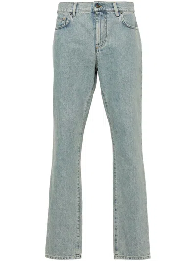 Moschino Straight Jeans With A Faded Effect In Blue