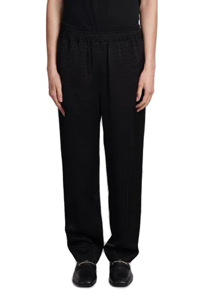 Balmain Monogram-jacquard Satin Trousers In Black