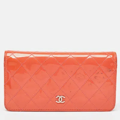 Pre-owned Chanel Orange Quilted Patent Leather Cc Yen Continental Wallet