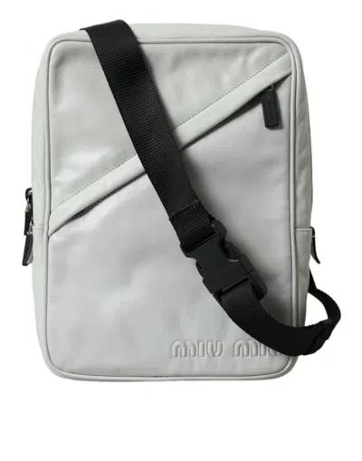 Miu Miu Elegant Black And White Leather Crossbody Bag In Brown