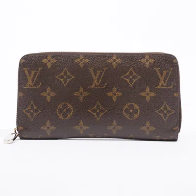 Pre-owned Louis Vuitton Zippy Wallet Monogram Coated Canvas In Brown