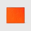 Gucci Gg Rubber-effect Bi-fold Wallet In Orange