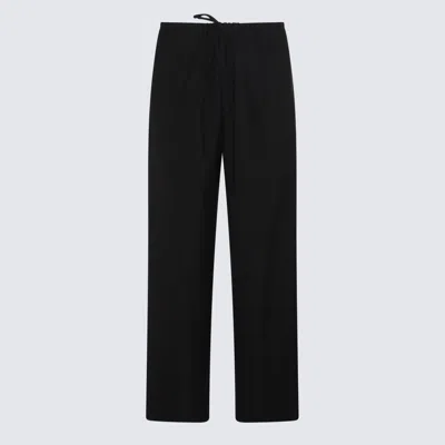 The Row Black Trousers