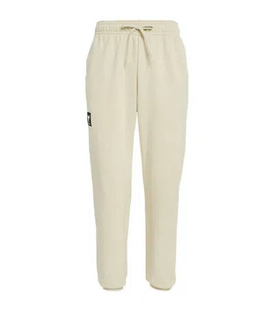Under Armour Project Rock Logo Sweatpants In Ivory