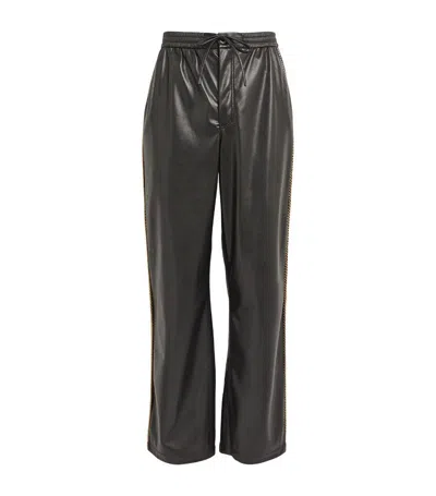 Nanushka Faux Leather Ceron Trousers In Black