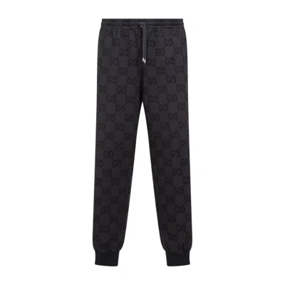 Gucci Monogram-patterned Tapered-leg Stretch-woven Jogging Bottoms In Grey
