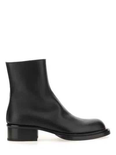 Alexander Mcqueen Tread Leather Ankle Boots In Black
