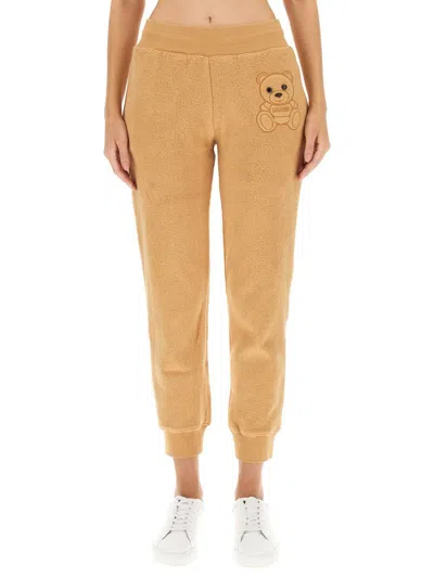 Moschino Jogging Pants With Logo In Beige