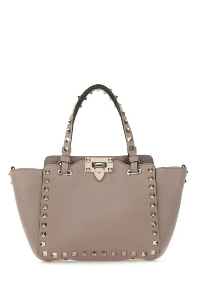 Valentino Garavani Woman Antiqued Pink Leather Mini Rockstud Handbag