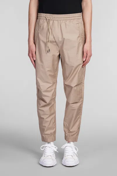 Maharishi Asym Tapered Track Trousers In Beige