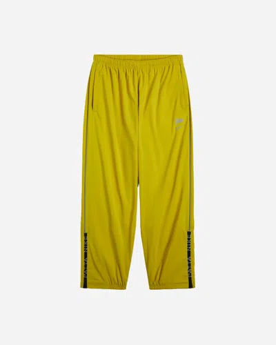 Nike Patta Running Team Track Pants Saffron Quartz In Yellow