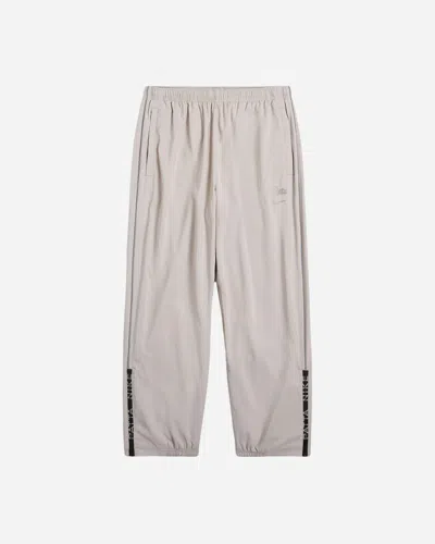 Nike Patta Running Team Track Pants Sanddrift / Cream In Grey