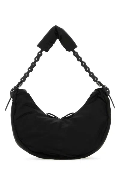 Innerraum Handbags. In Black