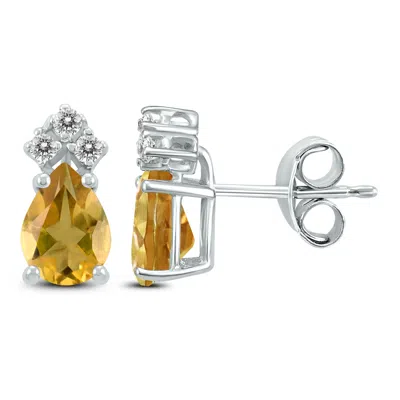 Sselects 14k 8x6mm Pear Citrine And Three Stone Diamond Earrings In Orange