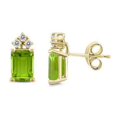 Sselects 14k 7x5mm Emerald Shaped Peridot And Three Stone Diamond Earrings In Green