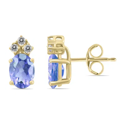 Sselects 14k 6x4mm Oval Tanzanite And Three Stone Diamond Earrings In Blue