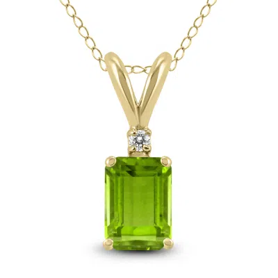 Sselects 14k 8x6mm Emerald Shaped Peridot And Diamond Pendant In Green
