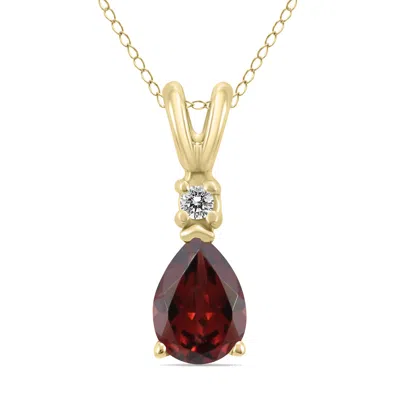 Sselects 14k 6x4mm Pear Garnet And Diamond Pendant In Red