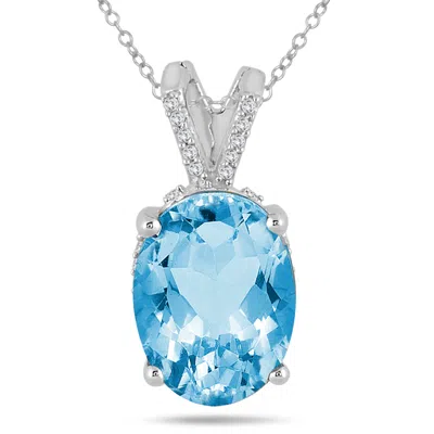 Sselects 7 Carat Oval Topaz And Diamond Engraved Pendant In 10k In Blue