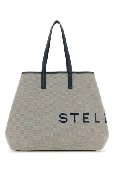 Stella Mccartney Sand Canvas Logo Shopping Bag In Brown