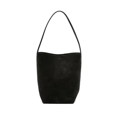 The Row Handbags. In Black
