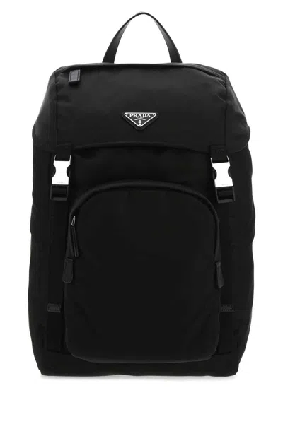 Prada Logo Plaque Padded Backpack In F0002
