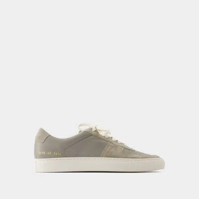 Common Projects Trainers In Grey