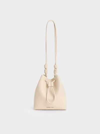 Charles & Keith Leia Knotted Bucket Bag In Beige