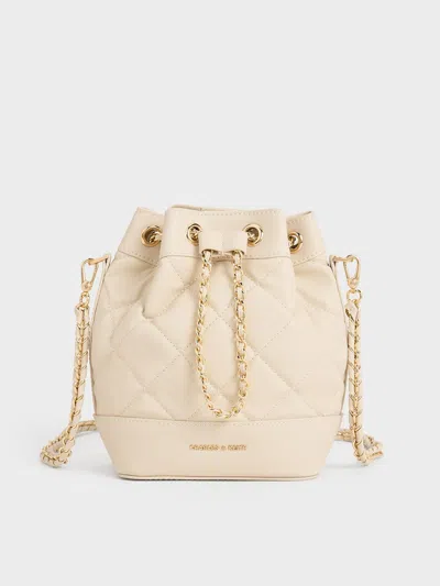 Charles & Keith Quilted Two-way Bucket Bag In Beige