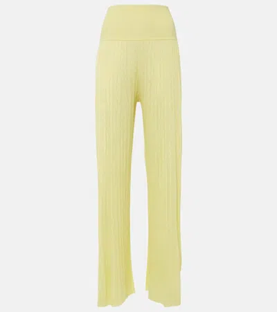 Alaïa Pleated High-rise Jersey Straight Trousers In Yellow