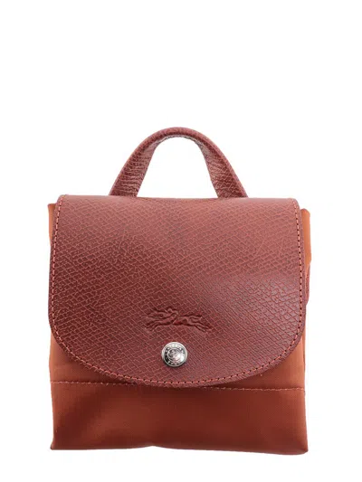 Longchamp Le Pliage Logo Embossed Zipped Backpack In Brown