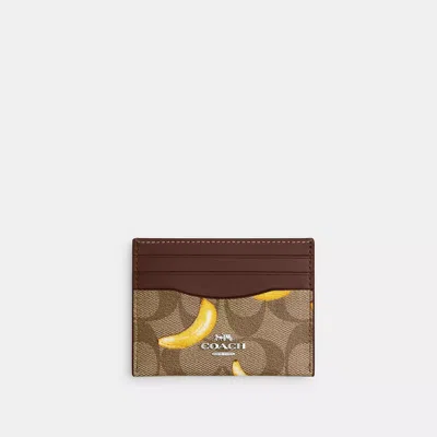 Coach Outlet Slim Id Card Case In Signature Canvas With Banana Print In Multi