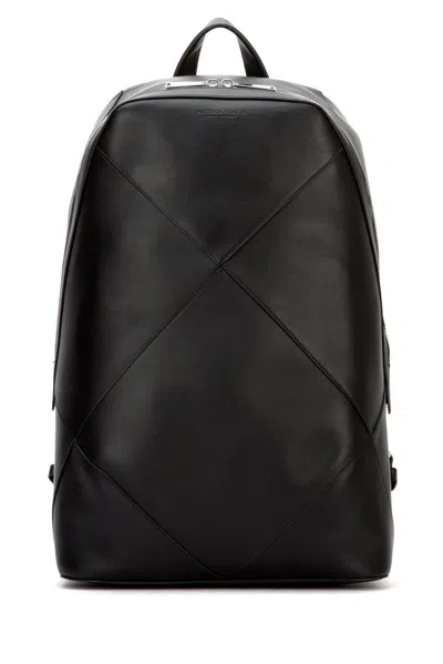 Bottega Veneta Logo Embossed Large Backpack In Black