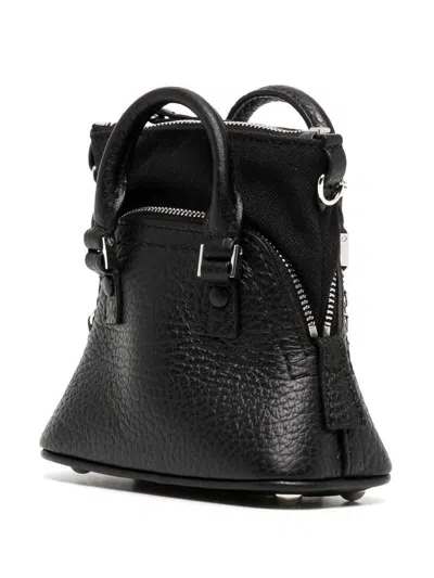 Maison Margiela Handbags. In Black