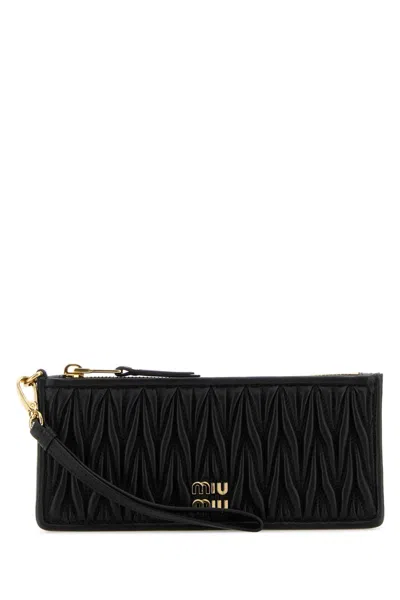 Miu Miu Nappa Leather Quilted Clutch With Detachable Strap In Black