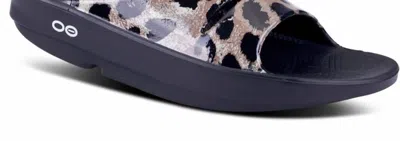 Oofos Women's Ooahh Limited Slide Sandal In Cheetah In Black